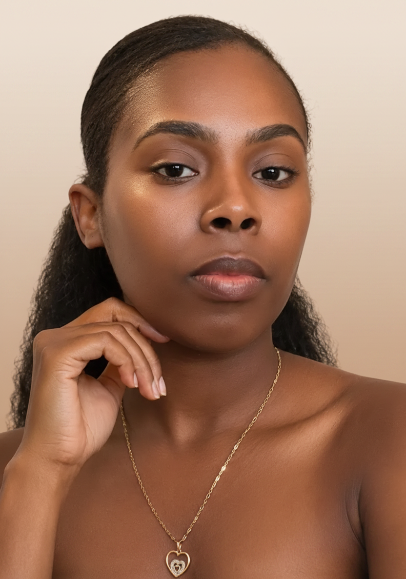 Skincare model applying face mask